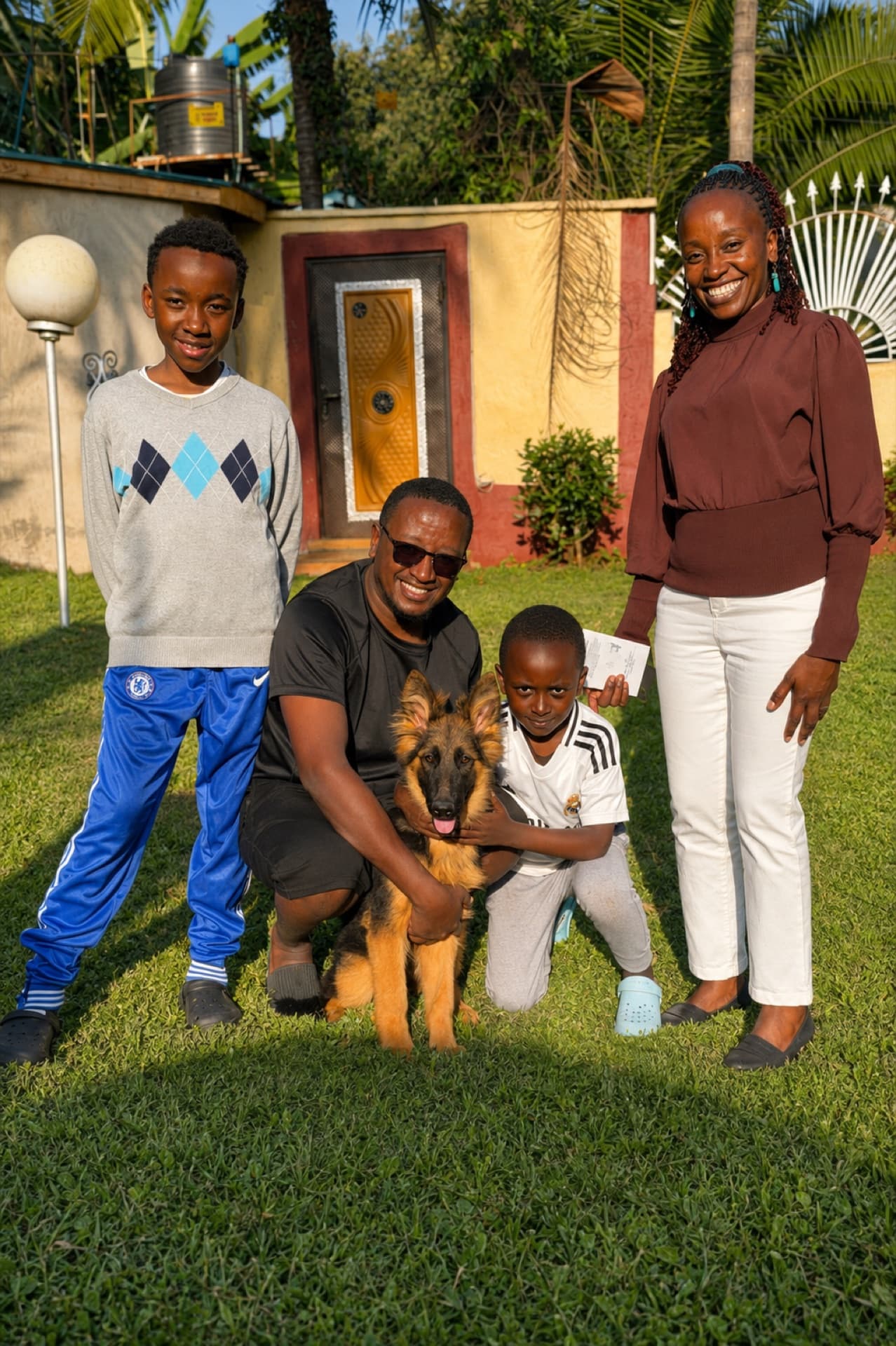 A family collecting their new Citadel K9s German Shepherd puppy